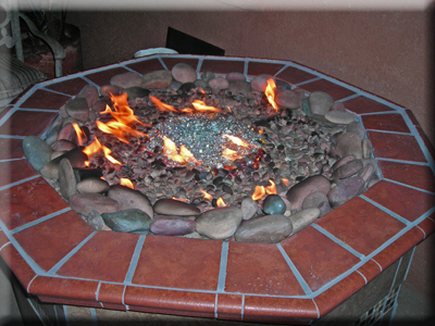 rocks and fire glass outdoor fire pit